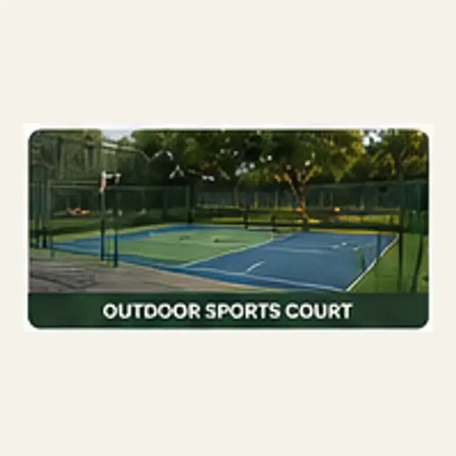 Outdoor sports court with perimeter space and landscaped surroundings